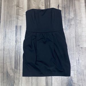 Sleeveless mini all black dress.
